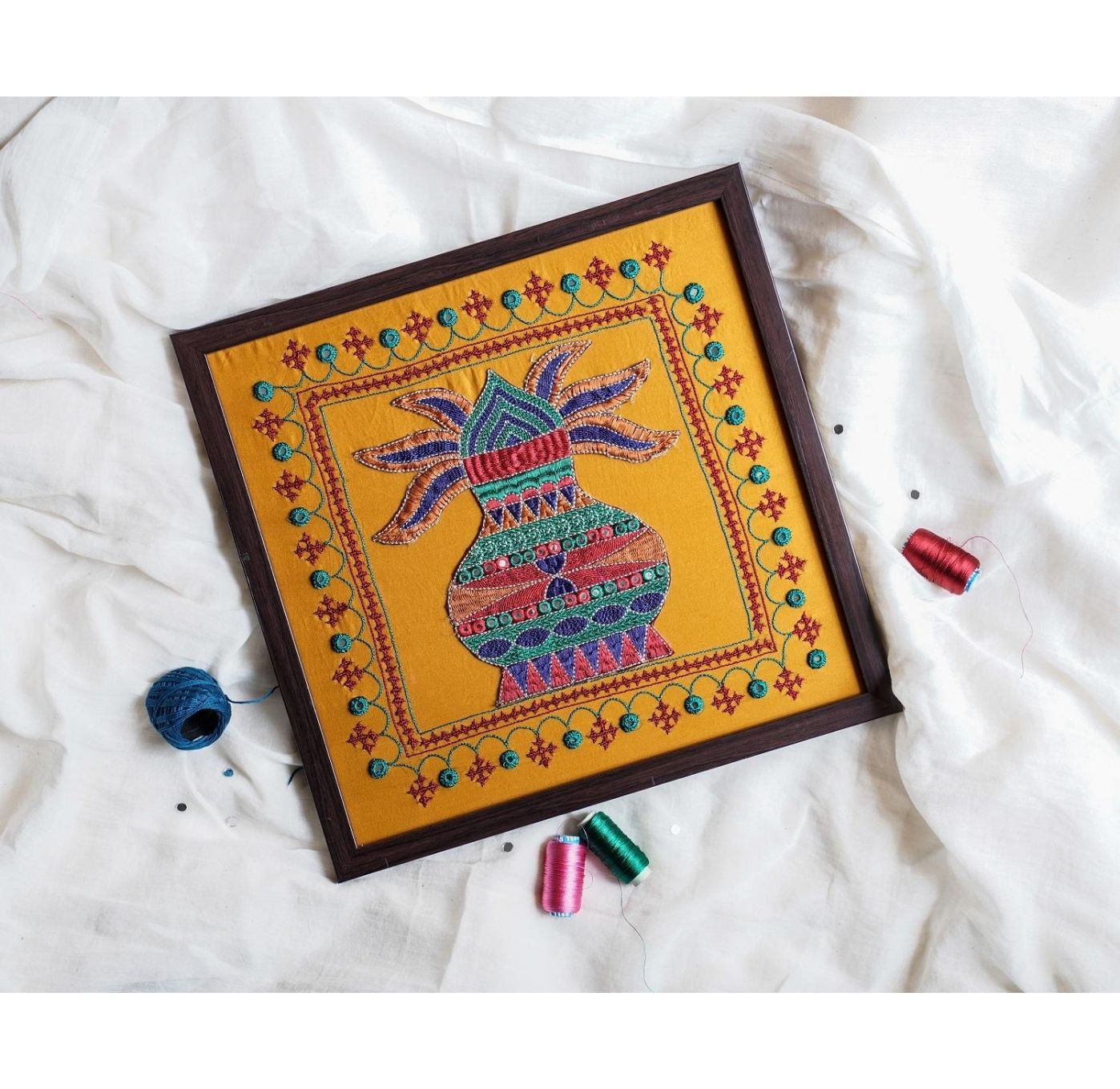 Purno-asya Kalasha Hande Embroidered Wall Hanging